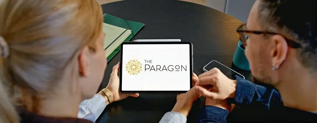 the paragon jackson apartments logo on a tablet